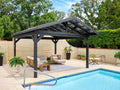 Lancaster steel gazebo with roof sheltering poolside lounge area with modern outdoor furniture and privacy fence in backyard.